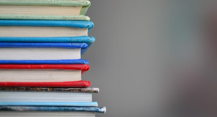 shallow focus photography of books