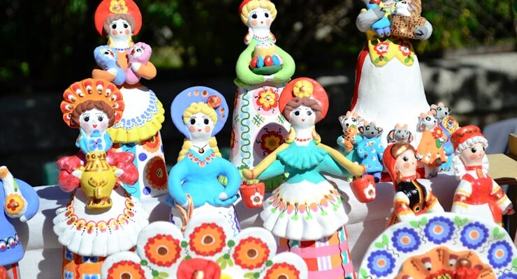 a group of colorful figurines sitting on top of a table